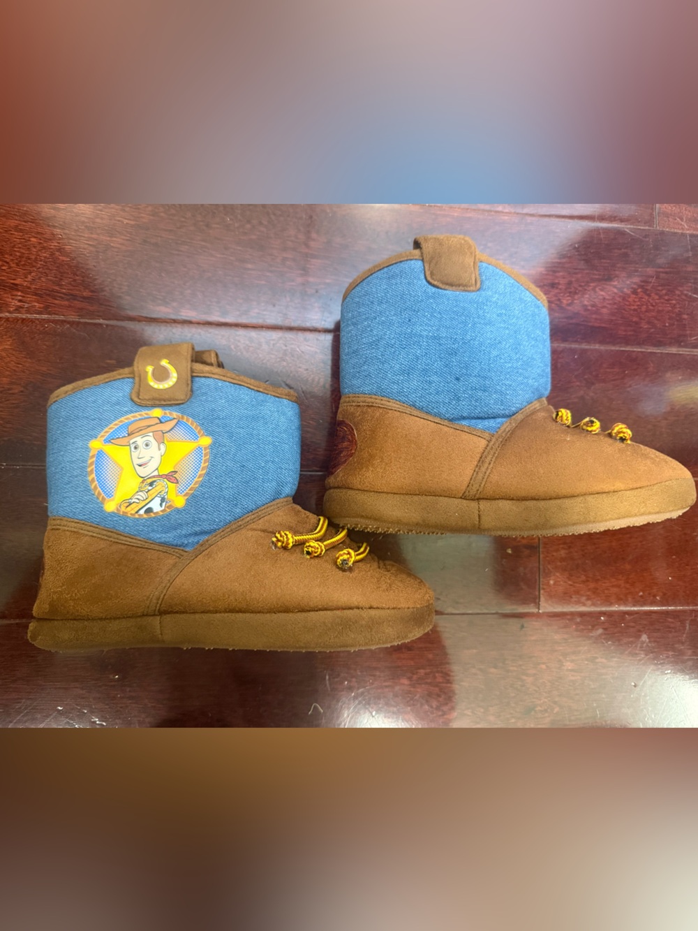 Disney Toy Story woody slippers that look like cowboy boots. Comfy.